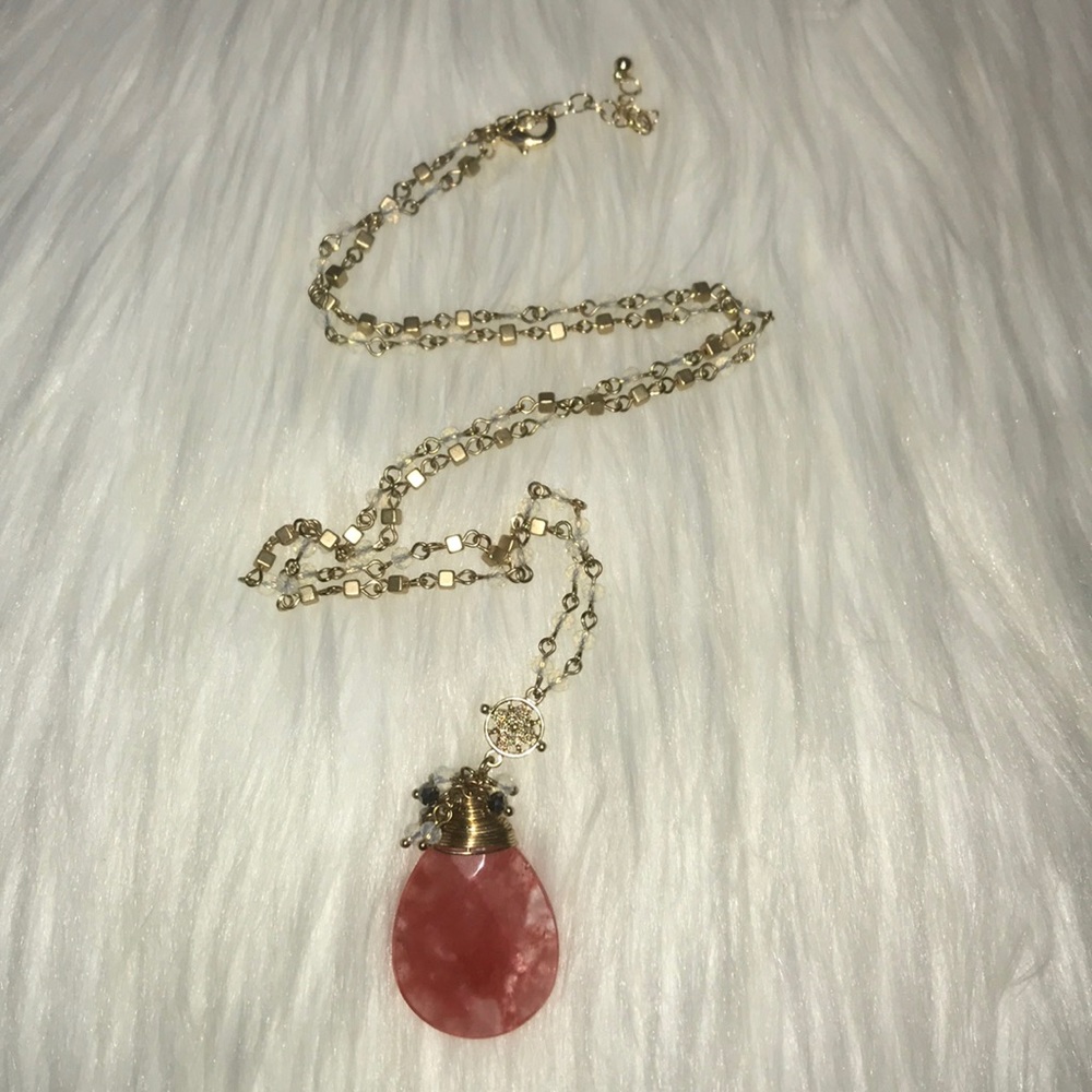 Long gold necklace